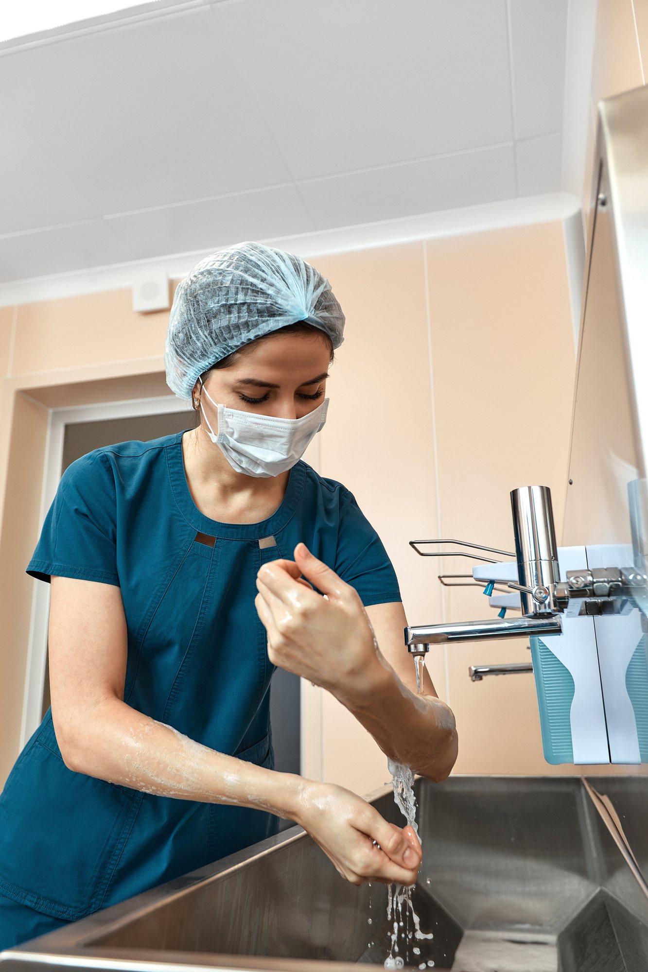 doctor washing her hands