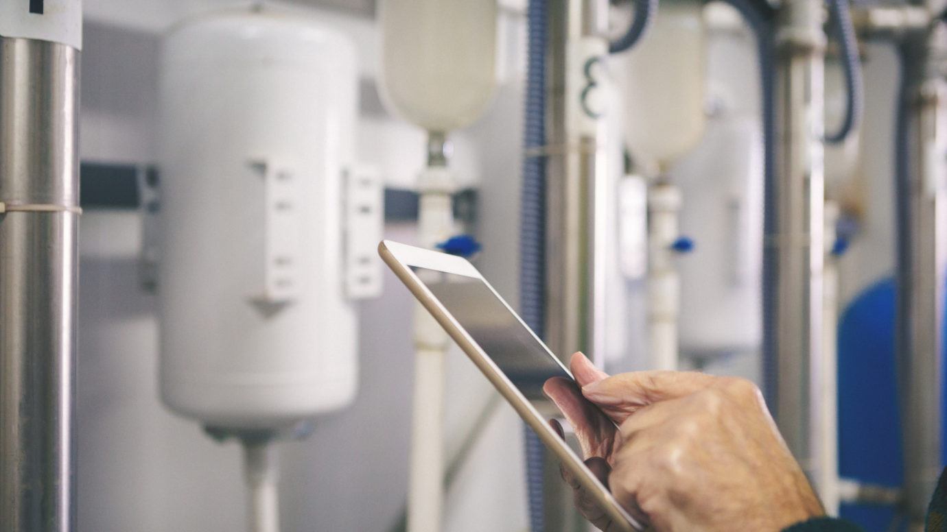 Close up shot of technician using tablet pc