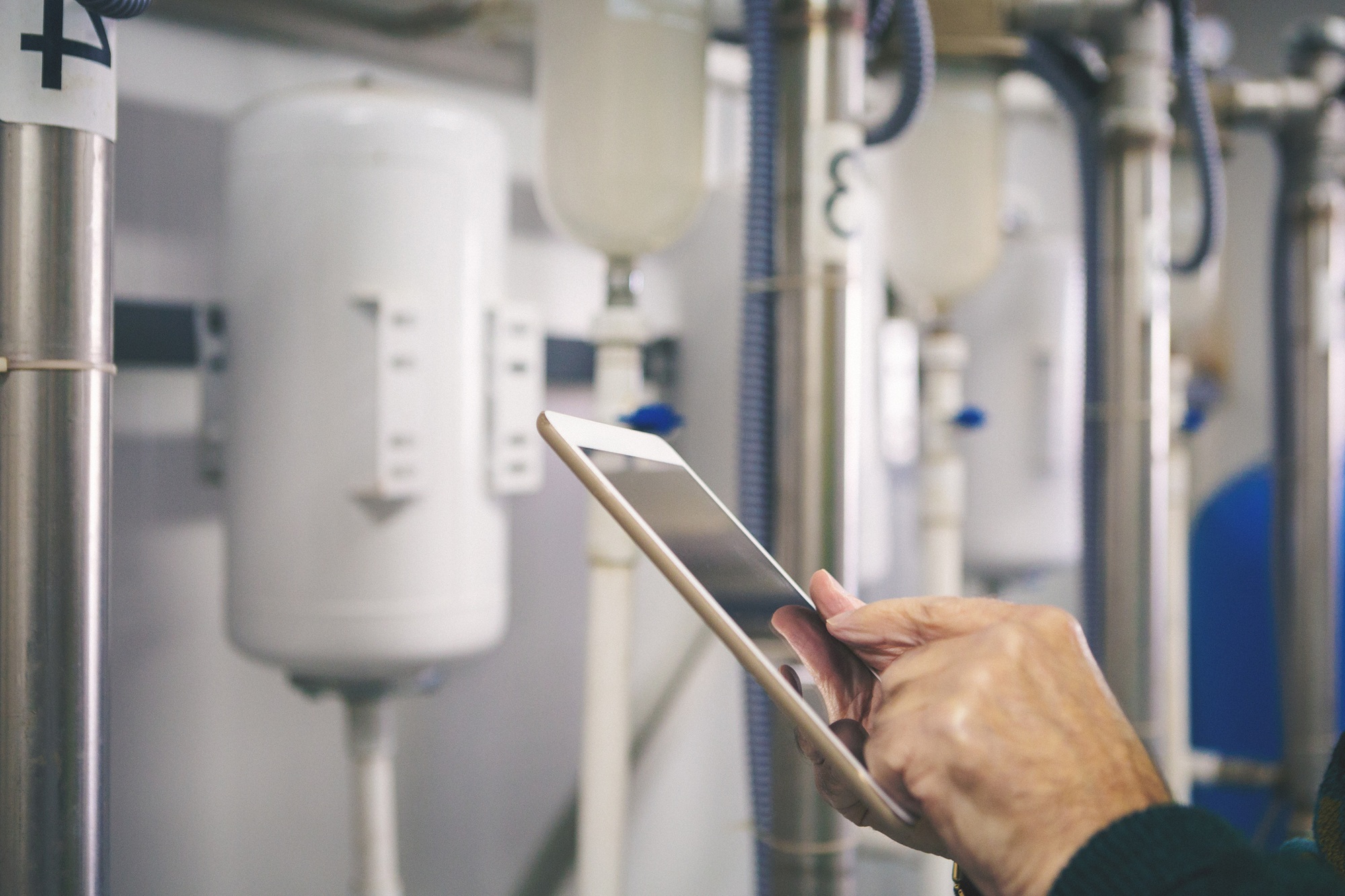 Close up shot of technician using tablet pc